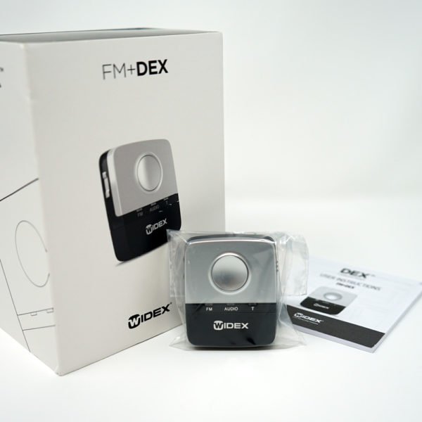 FM Dex with packaging and instruction manual on white background