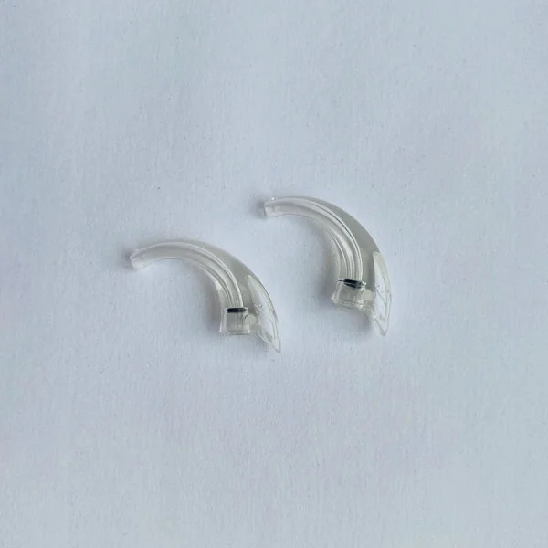 Widex D 9 series ear hooks on white background