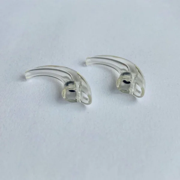 Widex D 9 series ear hooks against white background