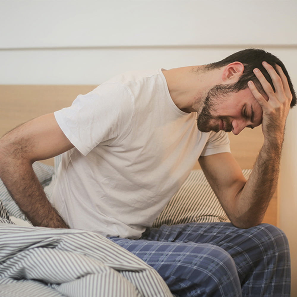 man suffering before bed