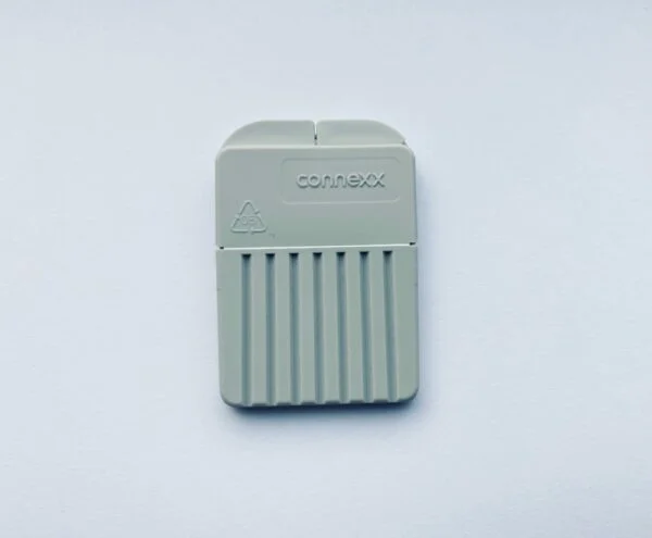 Photo of grey new unopened connexx waxtrap on white background